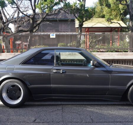 The Widebody's back end, commanding deference from traffic behind.