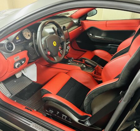 The V12’s roar, wrapped in the perfect silence of a sacred cockpit.