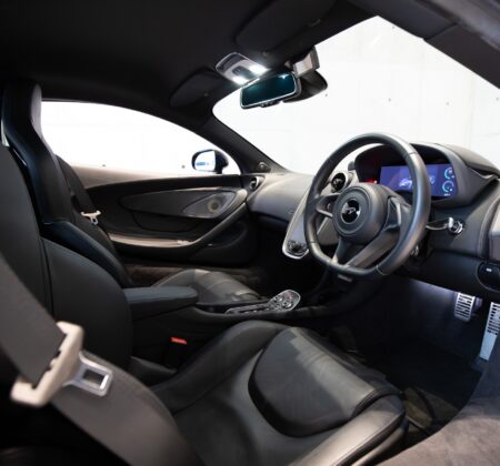 A Carbon Black Sanctuary of Focused Luxury