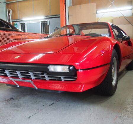 A Fluid Wedge Silhouette Cloaked in Striking Rosso
